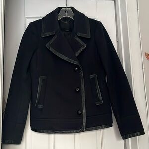 Beautiful, 100 percent wool, 100 percent leather women jacket by J.Crew.